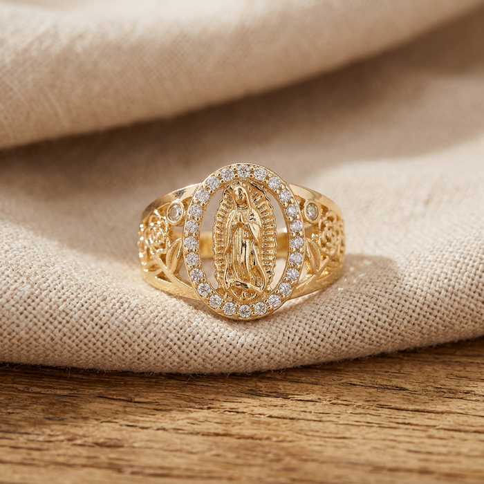Virgin Mary zirconia ring photographed from above on linen